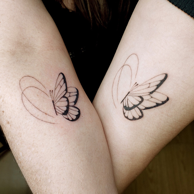 Tatouage papillon ligne fine Annecy